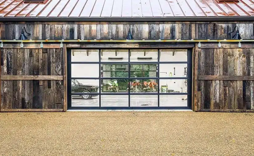 Black garage door on barn